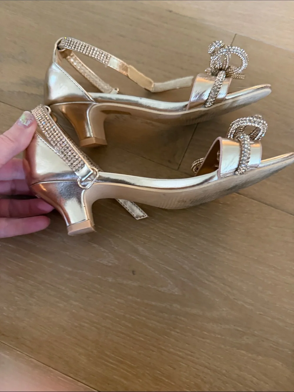 Elegant Metallic Rose Gold Heeled Sandals with Decorative Knot